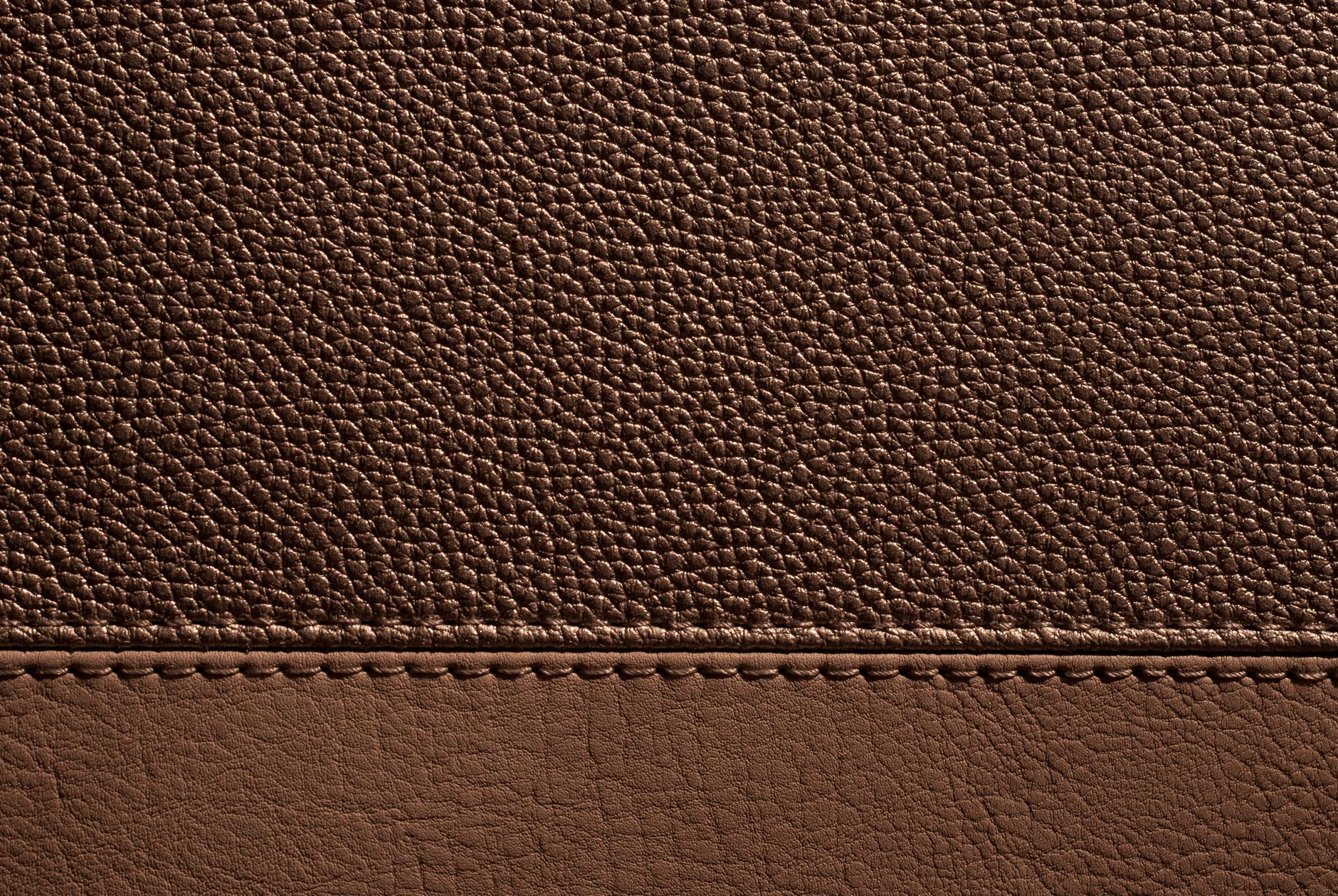 close-up of a quilted cashmere-blend mattress cover with visible stitching texture